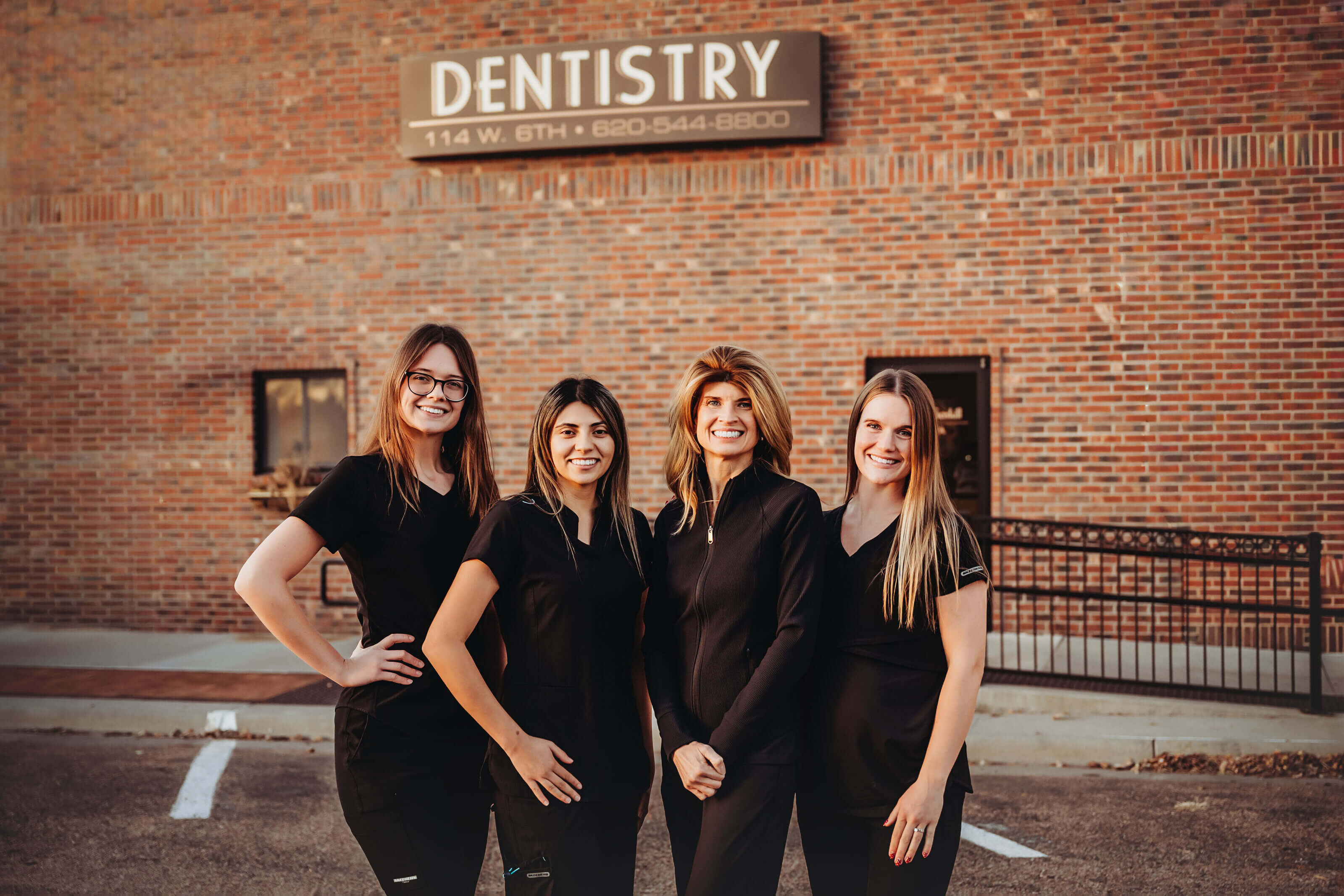 Team in front of office